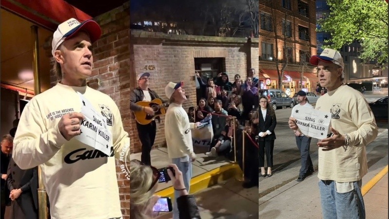 Robbie Williams sorprendi&oacute; a sus fans en Buenos Aires con un show ac&uacute;stico en la puerta de su hotel
