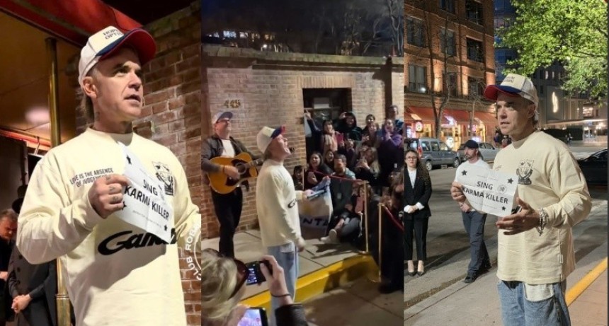 Robbie Williams sorprendi&oacute; a sus fans en Buenos Aires con un show ac&uacute;stico en la puerta de su hotel